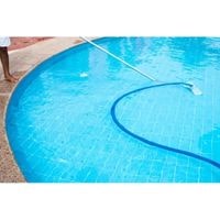 clean pool tile with pressure washer