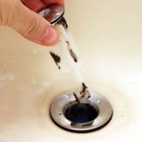 remove stopper from bathroom sink